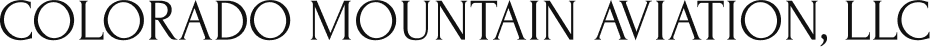Partial view of a green sign with white text.